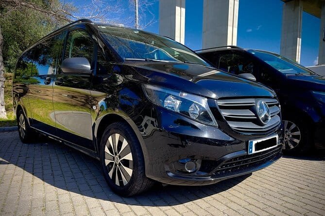 Transfer de carro particular - carrinha escura